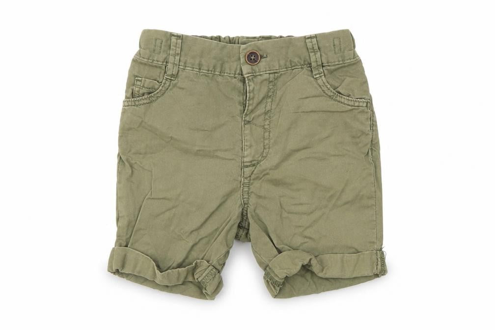 Front view of Nutmeg Baby Green Cropped Trousers, size 12-18, Months