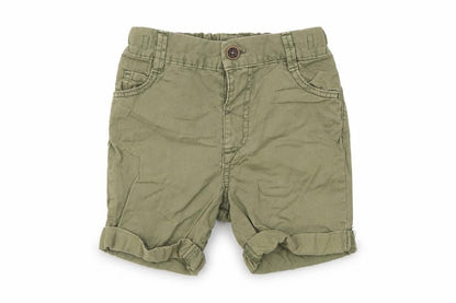 Front view of Nutmeg Baby Green Cropped Trousers, size 12-18, Months