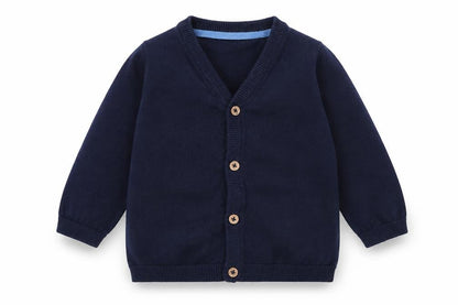 Front view of H&M girls’ blue cardigan jumper, size 3-6, months