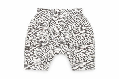 Front view of Matalan girls’ white animal print sweatpants, size 9-12, months