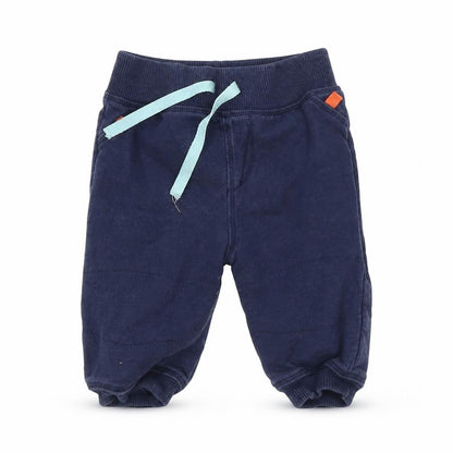 Front view of Marks & Spencer Baby Blue Jogger Trousers, size 3-6, Months