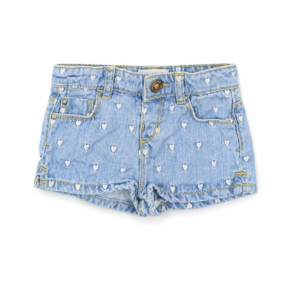 Front view of Zara girls’ blue geometric cropped jeans, size 9-12, months