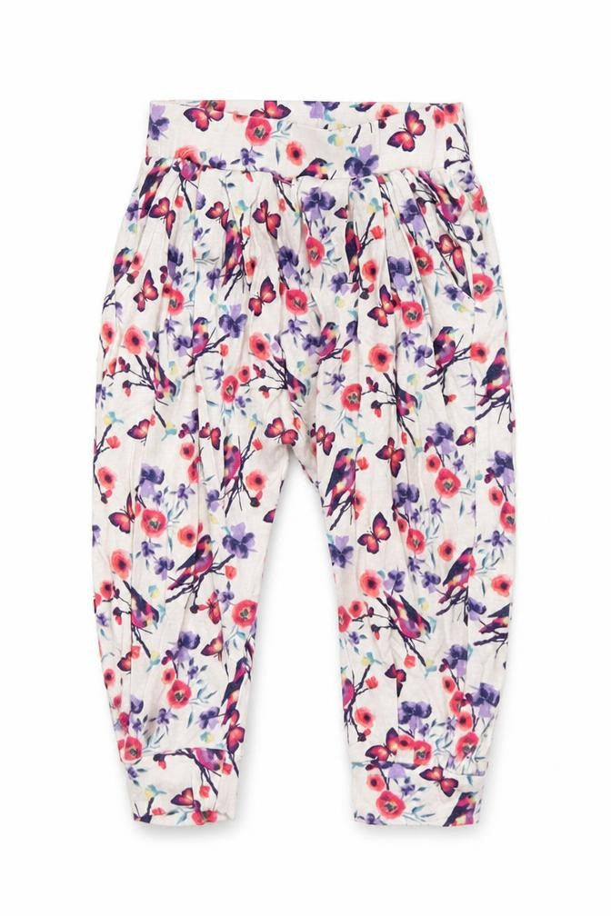 Front view of dymples girls’ white floral jogger trousers, size 12, months