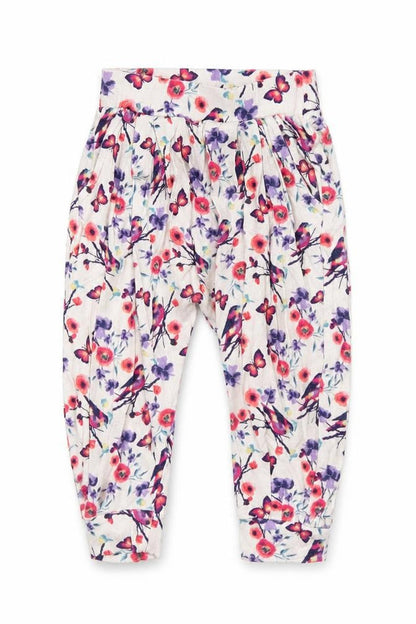 Front view of dymples girls’ white floral jogger trousers, size 12, months