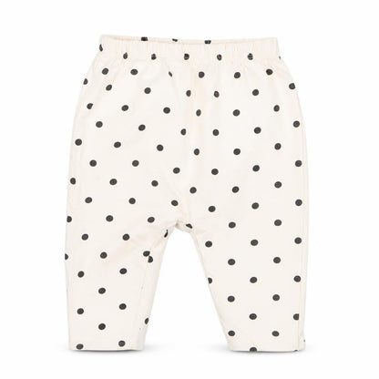 Front view of Tu girls’ ivory polka dot capri trousers, size 6-9, months