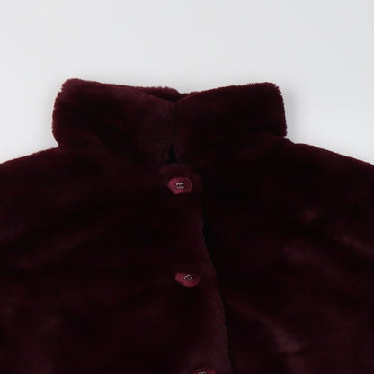 Close-up detail of TU women’s red jacket coat, size UK 12