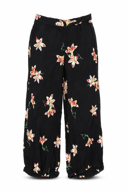 Front view of Miss Selfridge women’s black floral capri trousers, size UK 6, 20-inch leg