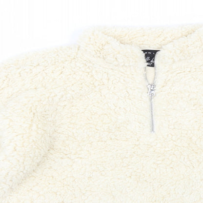 Close-up detail of New Look women’s beige pullover sweatshirt, size S