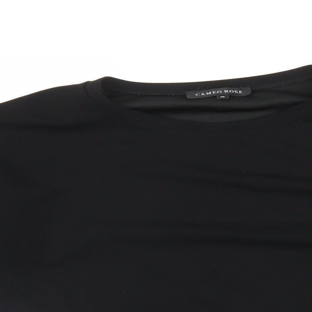 Close-up detail of Cameo Rose women’s black pullover sweatshirt, size M