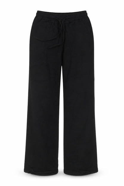 Front view of Preworn women’s black trousers, size M, 27-inch leg