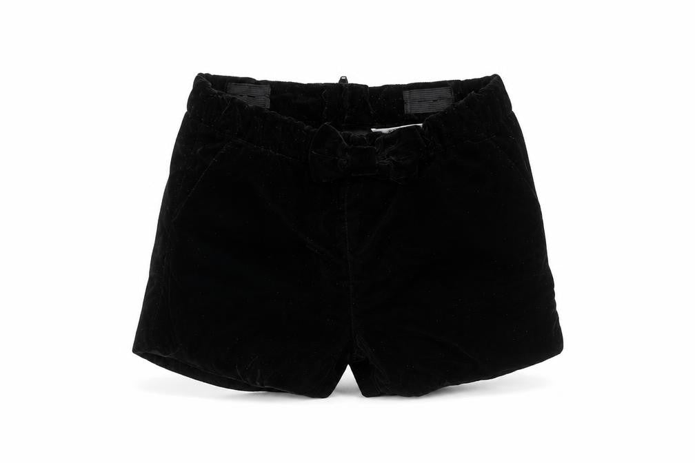 Front view of H&M girls’ black sweat shorts, size 5-6, years