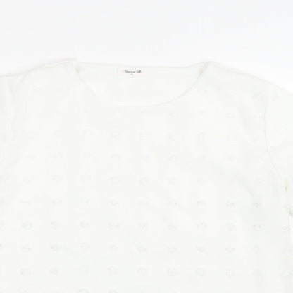 Close-up detail of Bloomin Jelly women’s white polka dot basic t-shirt, size M