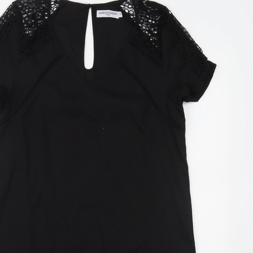 Close-up detail of Marilyn&John women’s black a-line, size S