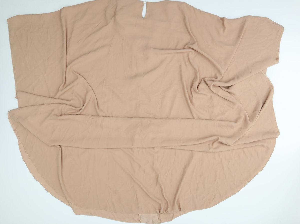 Back view of filizzade women’s beige poncho, size UK 2