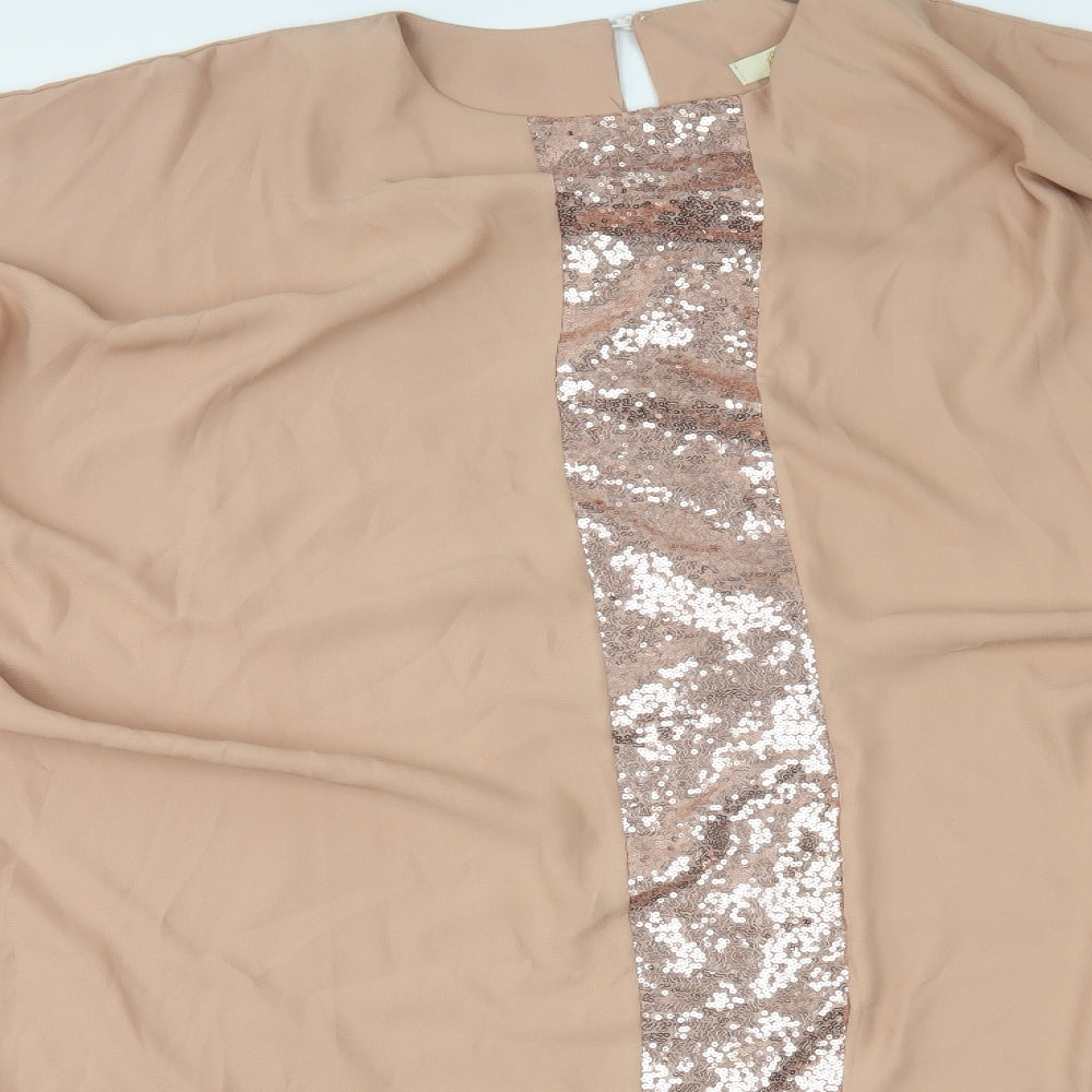 Close-up detail of filizzade women’s beige poncho, size UK 2