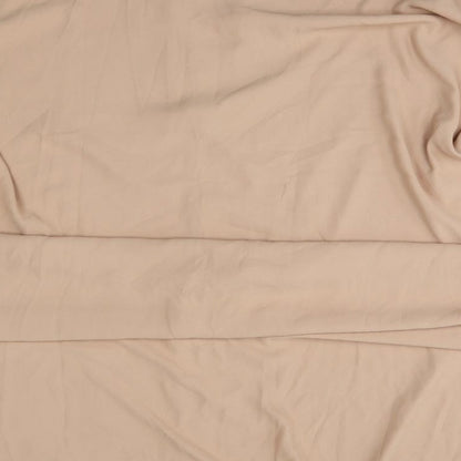 Brand and care label for filizzade women’s beige poncho, size UK 2