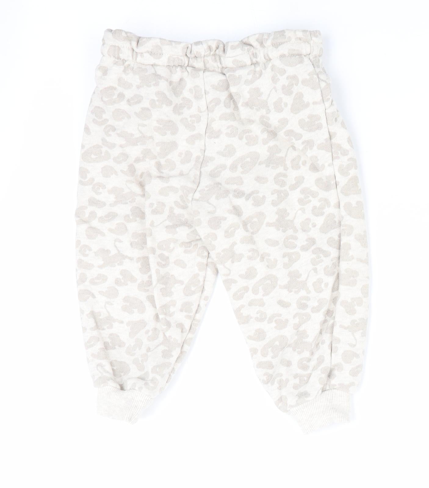 Lion King at George Baby Ivory Animal Print  Jogger Trousers Size 12-18 Months