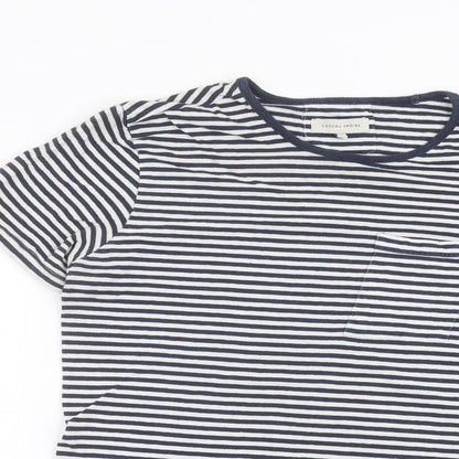 Close-up detail of casual friday women’s white striped basic t-shirt, size M