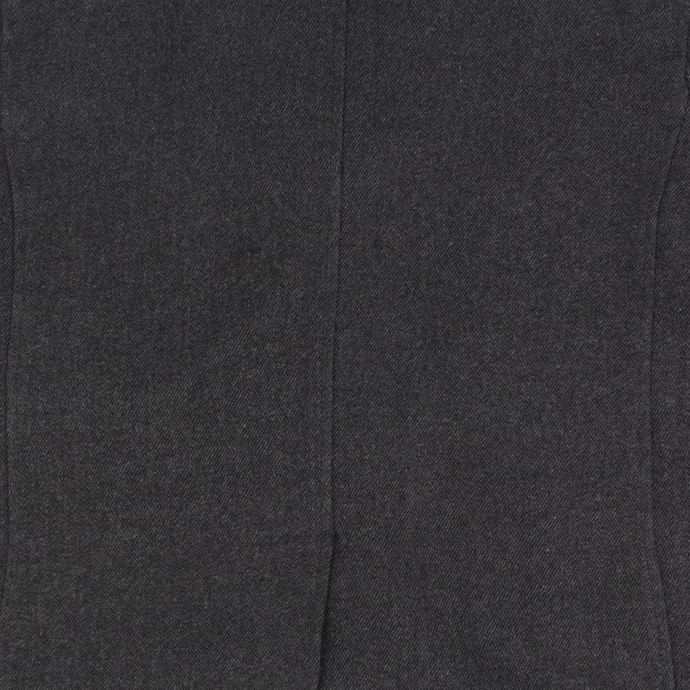 Brand and care label for Aspen & Court women’s brown overcoat jacket