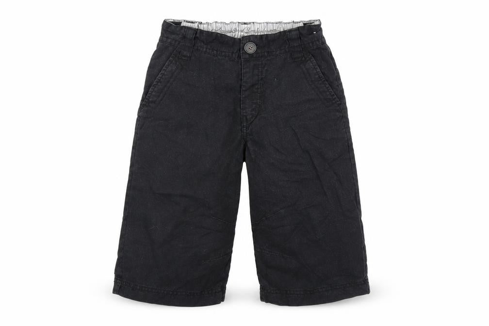 Front view of Next boys’ black cropped trousers, size 6, years