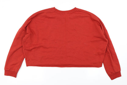 Back view of Primark women’s orange pullover sweatshirt, size XS, - cropped