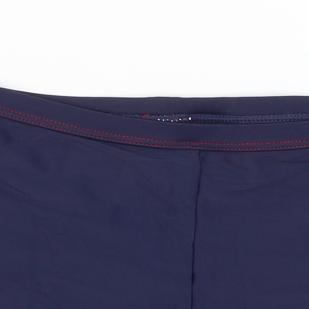 Close-up detail of Tu girls’ blue compression shorts, size 9, years