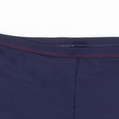 Close-up detail of Tu girls’ blue compression shorts, size 9, years