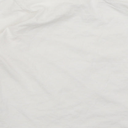 Brand and care label for Primark girls’ white basic t-shirt, size 6-7, years