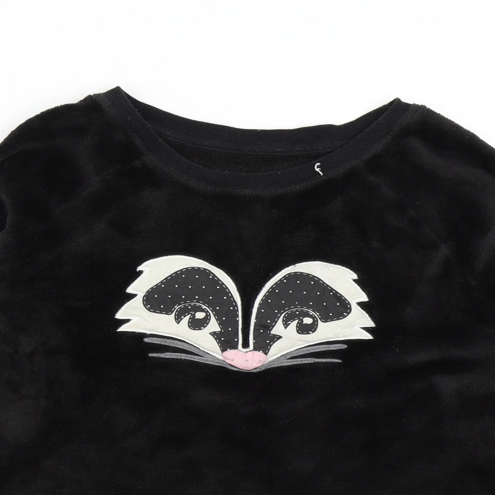 Close-up detail of Marks & Spencer women’s black solid fleece top pyjama top, size UK 8, - skunk
