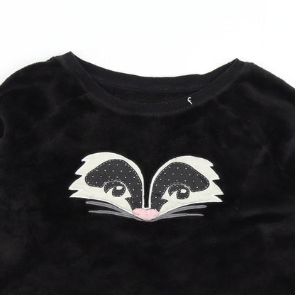 Close-up detail of Marks & Spencer women’s black solid fleece top pyjama top, size UK 8, - skunk