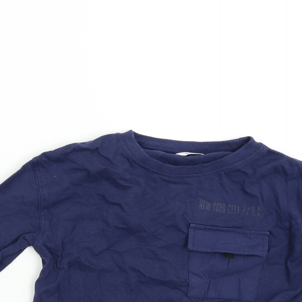 Close-up detail of M&Co girls’ blue basic t-shirt, size 4-5, years