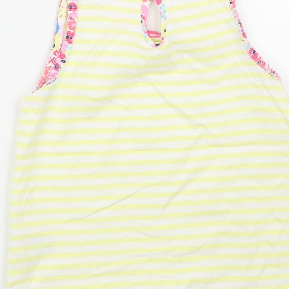 Brand and care label for Matalan girls’ yellow striped basic blouse, size 4, years