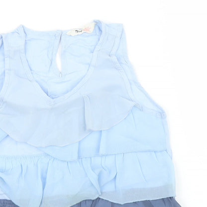 Close-up detail of H&M girls’ blue basic blouse, size 10, years