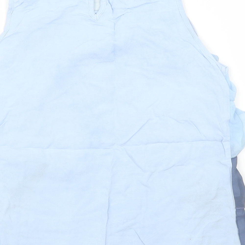 Brand and care label for H&M girls’ blue basic blouse, size 10, years