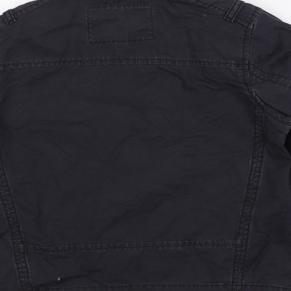 Brand and care label for Preworn boys’ blue jacket, size 9, years