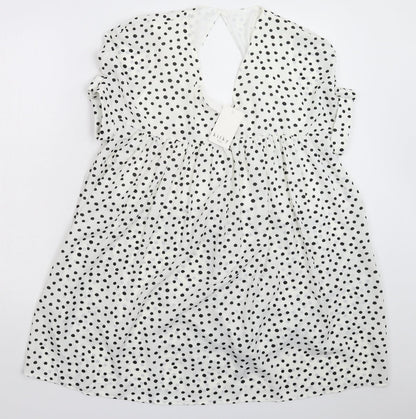 Additional front view of Kilky women’s white polka dot mini, size M