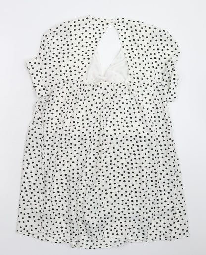 Back view of Kilky women’s white polka dot mini, size M