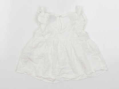 Back view of Primark girls’ white basic blouse, size 4-5, years
