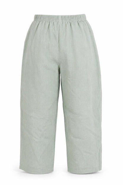 Front view of Preworn women’s green trousers, size UK 6, 26-inch leg