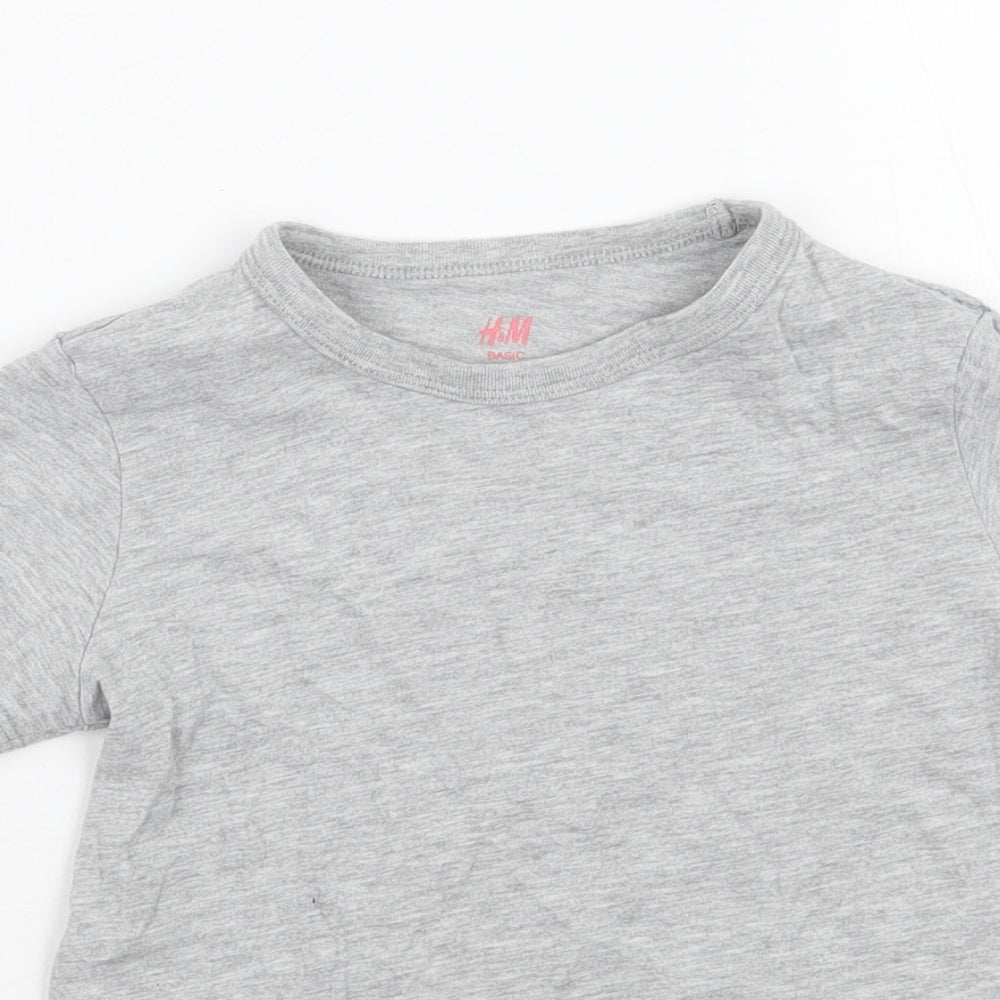 Close-up detail of H&M girls’ grey basic t-shirt, size 3, years