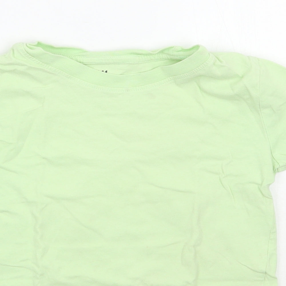Close-up detail of H&M boys’ green basic t-shirt, size 5, years