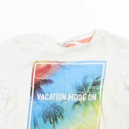 Close-up detail of H&M boys’ white basic t-shirt, size 3, years