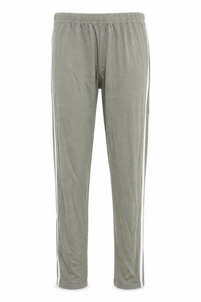 Front view of Boohoo women’s green track pants leggings, size UK 10, 26-inch leg