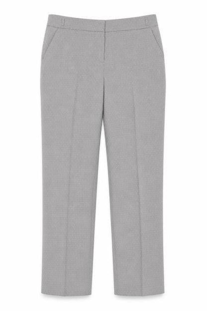 Front view of F&F women’s grey polka dot trousers, size UK 14, 30-inch leg