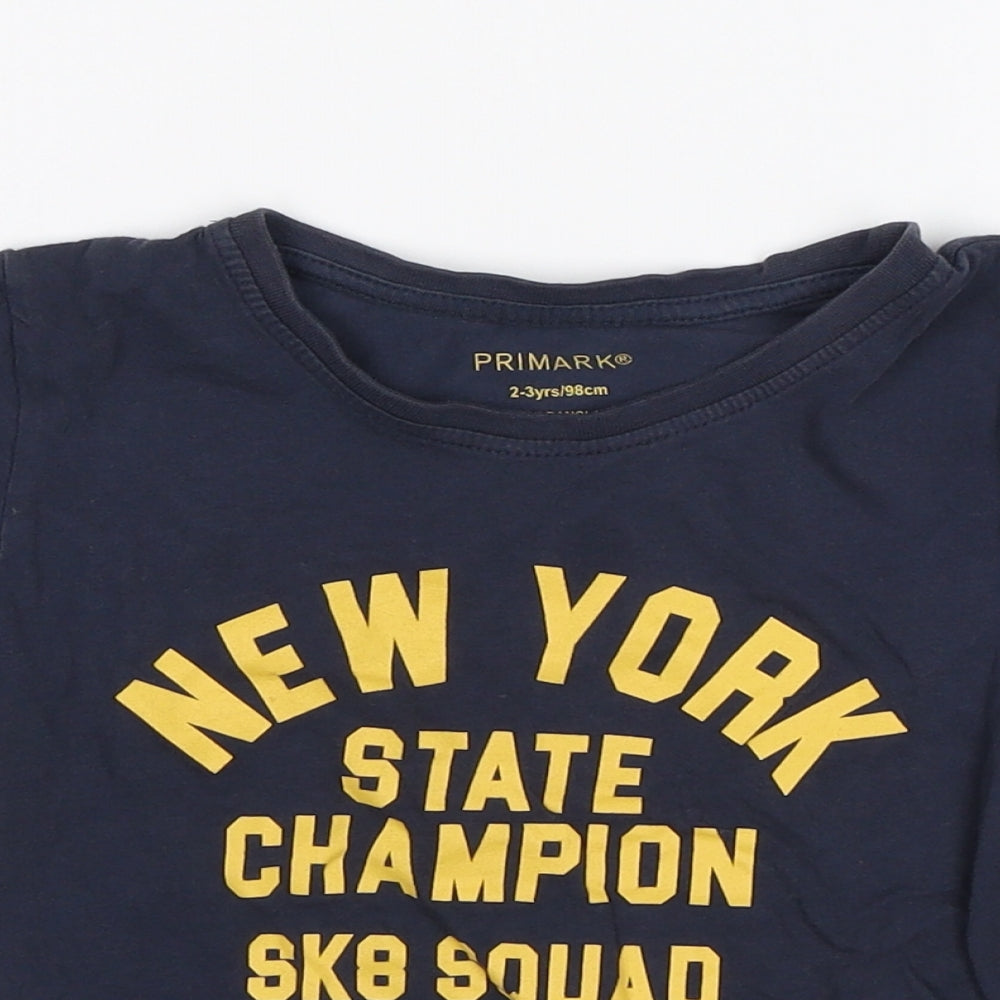 Close-up detail of Primark boys’ blue basic t-shirt, size 2-3, years