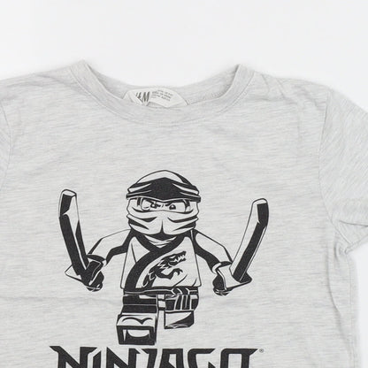Close-up detail of H&M boys’ grey basic t-shirt, size 5-6, years - lego