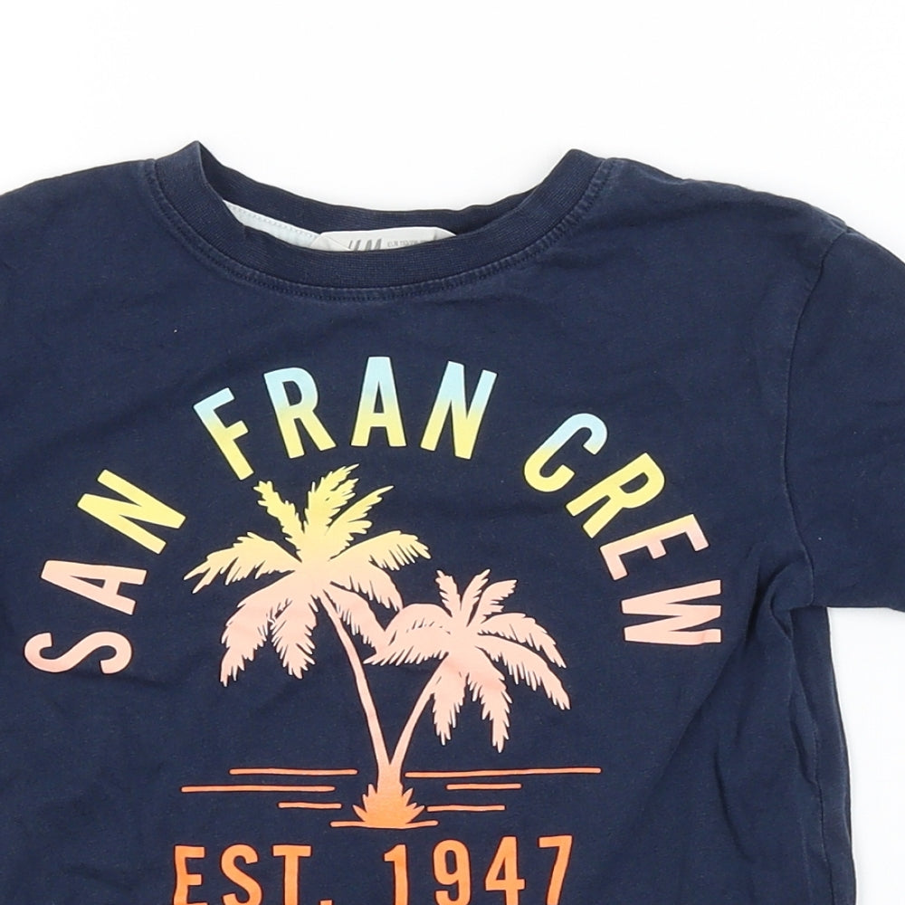 Close-up detail of H&M girls’ blue basic t-shirt, size 5-6, years