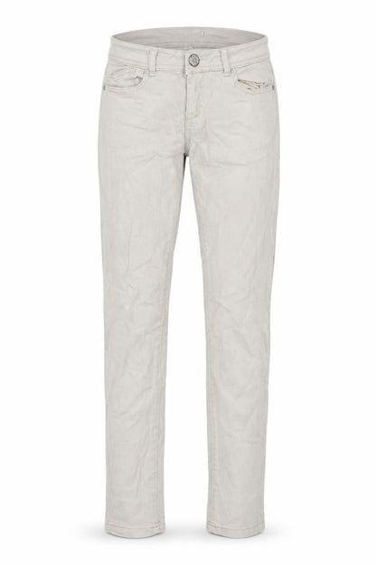 Front view of women’s beige denim skinny jeans, size UK 32, in, 32-inch leg