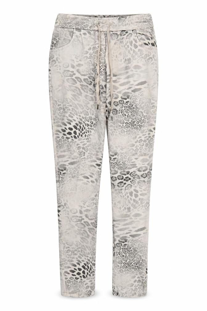 Front view of Preworn women’s beige animal print trousers, size UK 32, in, 28.5-inch leg