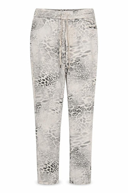 Front view of Preworn women’s beige animal print trousers, size UK 32, in, 28.5-inch leg